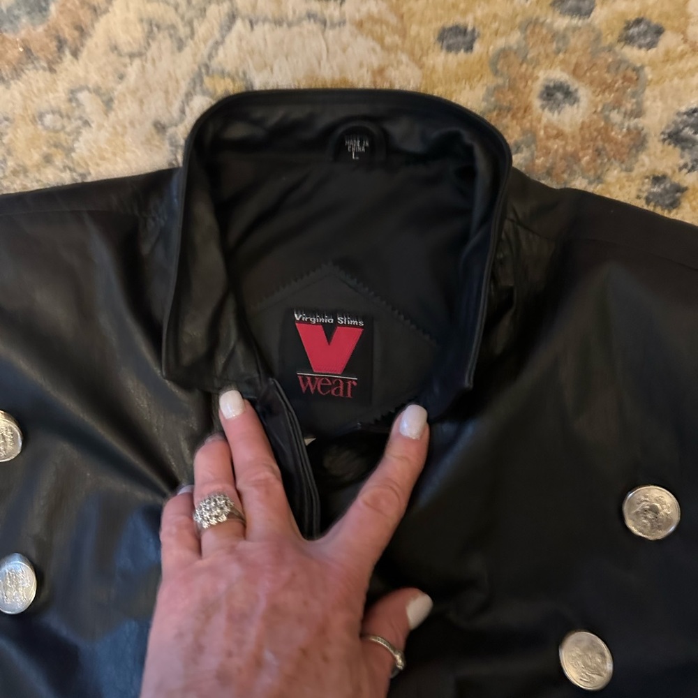 Virgins Slims Genuine Leather black ladies coat. Fully lined, pockets .
